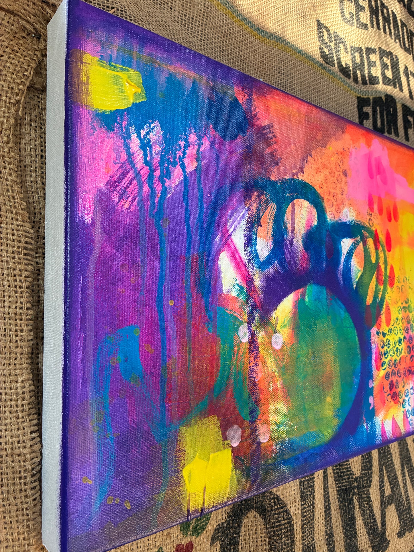 Side view of Dangerous Duo diptych showing depth of canvases and layered paint texture.