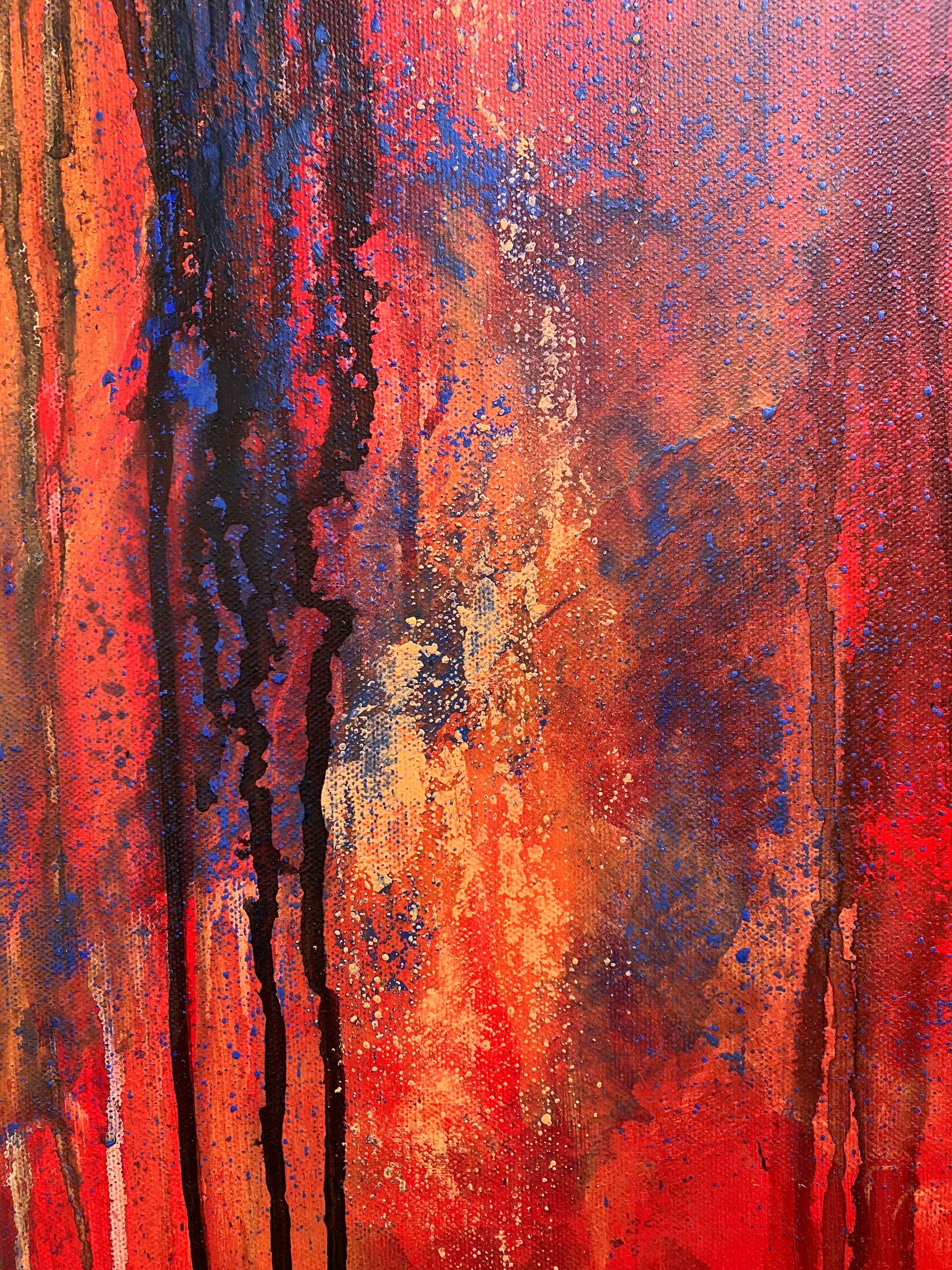 Close up of original abstract acrylic painting titled Bravest. Bold vertical drips of black, blue, and deep orange cascade over a fiery red and orange background. Rich texture and layered color evoke emotion and resilience.