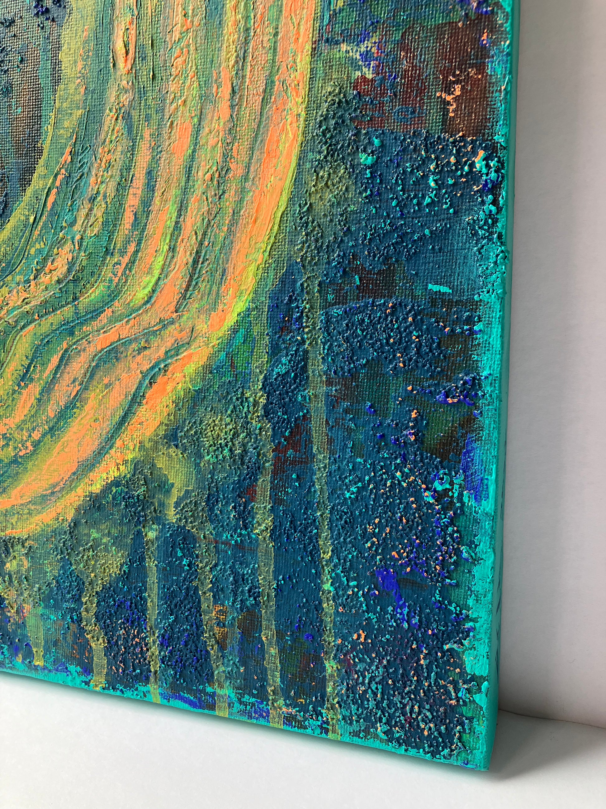 Close up of textured abstract painting in vibrant peach, gold, and turquoise tones, resembling soft sunlight on a majestic saguaro cactus. Artwork by J. Elise.