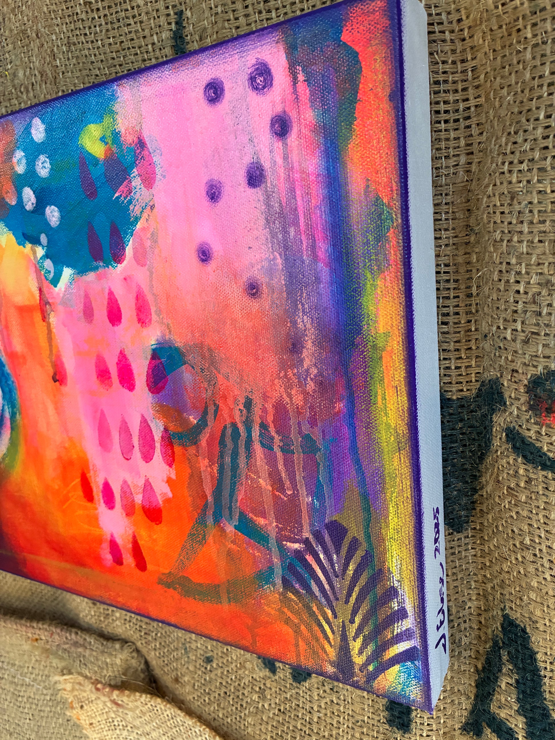 Side view of Dangerous Duo diptych showing depth of canvases and layered paint texture.