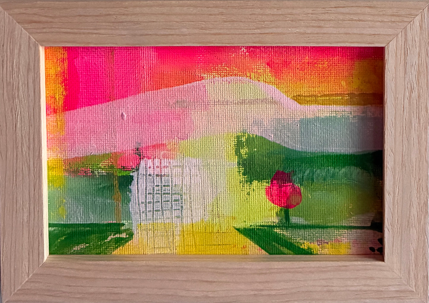 Small framed acrylic painting of a colorful abstract coastal landscape with a single bright pink tree, titled “San Diego Summer II".